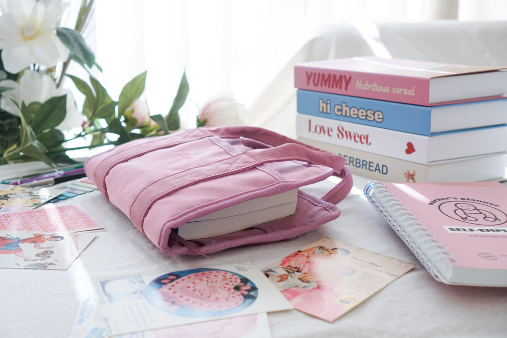 Personalised pink book bag with handles, hot pink stationery pouch with initial, matching pink book cover and pencil case, screen-free wellness gifts for readers, unique birthday gift for bookworms, water-resistant pink book pouch, luxury reading bundle f