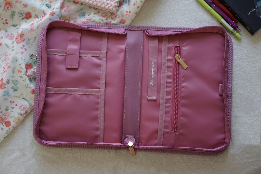 Personalised pink stationery pouch for pens and tabs, small book pouch for light reading, aesthetic pink zipper bag for book lovers, daily essentials organizer for women, custom initial pink book pouch, travel-size stationery bag for readers.